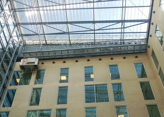 Gantry with a BMU cradle suspended from it